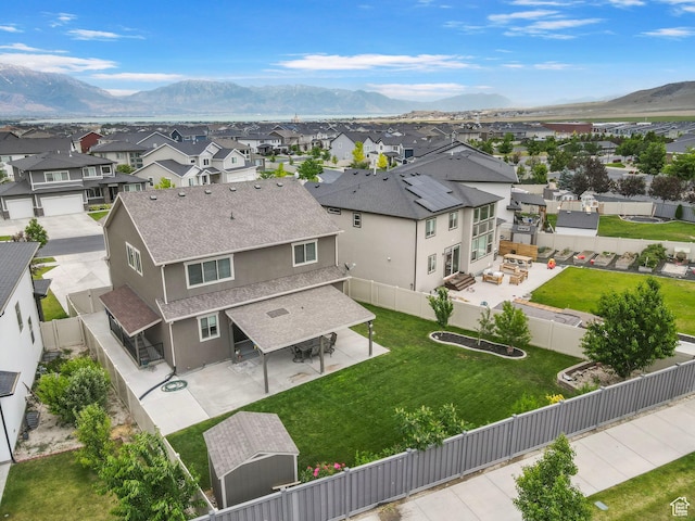 7335 N Harvest Crop Dr, Eagle Mountain, UT 84005 - aerial perspective of suburban area featuring a mountain backdrop