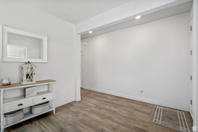 7335 N Harvest Crop Dr, Eagle Mountain, UT 84005 - unfurnished room with wood finished floors and recessed lighting