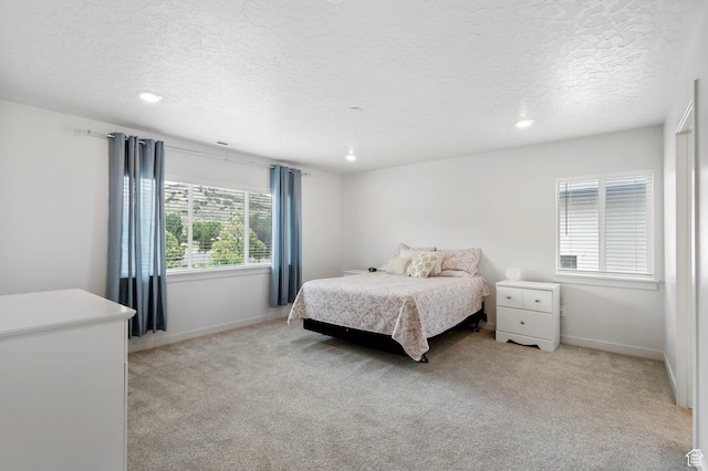 7335 N Harvest Crop Dr, Eagle Mountain, UT 84005 - bedroom with light carpet, recessed lighting, and a textured ceiling