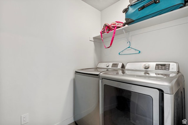 7335 N Harvest Crop Dr, Eagle Mountain, UT 84005 - washroom featuring separate washer and dryer and baseboards