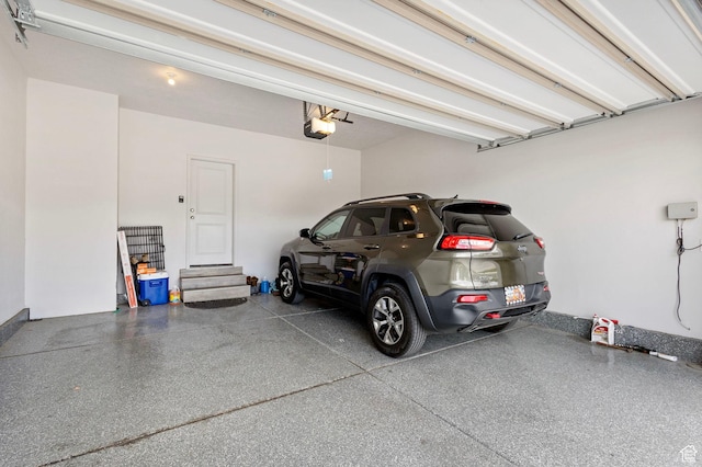 7335 N Harvest Crop Dr, Eagle Mountain, UT 84005 - garage featuring a garage door opener