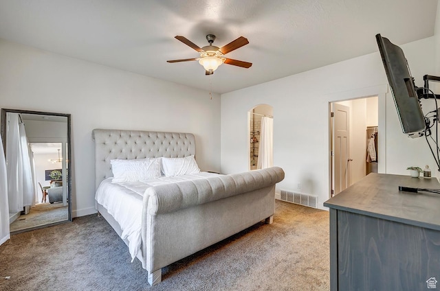 56 N Rue De Matth W, Vineyard, UT 84058 - bedroom featuring light colored carpet, arched walkways, and ceiling fan
