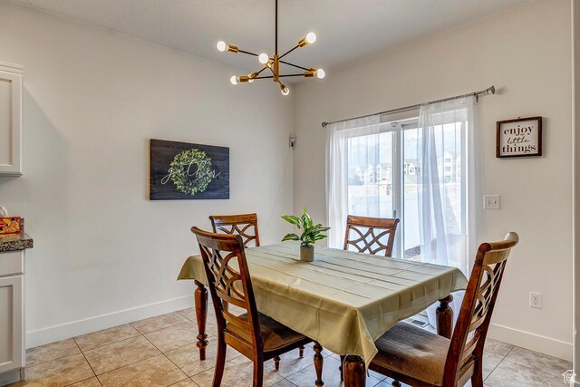 56 N Rue De Matth W, Vineyard, UT 84058 - dining space featuring a chandelier and light tile patterned flooring