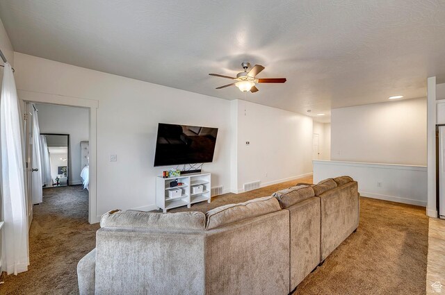 56 N Rue De Matth W, Vineyard, UT 84058 - living area featuring ceiling fan and light colored carpet