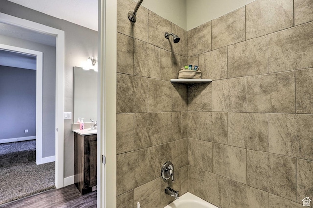 615 W 470 N, Moab, UT 84532 - bathroom view of tub / shower combination, wood finished floors, and vanity