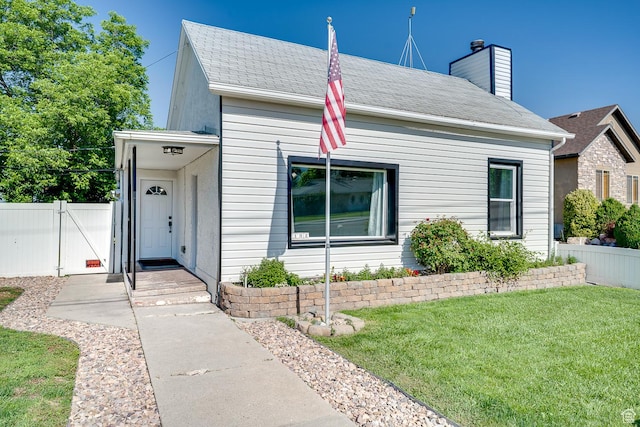 1132 S 1100 W, Provo, UT 84601 - view of front of property with a chimney, roof with shingles, and a gate