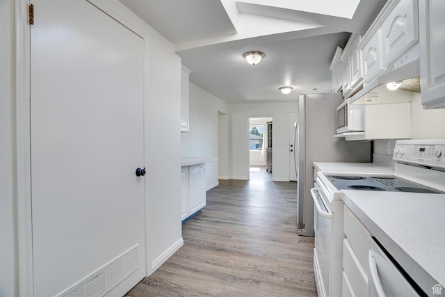 1132 S 1100 W, Provo, UT 84601 - kitchen featuring white appliances, light countertops, white cabinets, and light wood-style floors