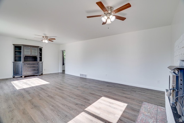1132 S 1100 W, Provo, UT 84601 - unfurnished living room with ceiling fan and wood finished floors
