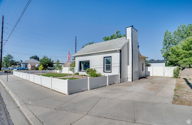 1132 S 1100 W, Provo, UT 84601 - bungalow with a gate, a chimney, and concrete driveway