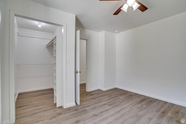 1132 S 1100 W, Provo, UT 84601 - unfurnished bedroom featuring wood finished floors, ceiling fan, and a closet
