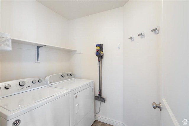 4509 S Greystock Cir W, West Valley City, UT 84120 - laundry area with washer and clothes dryer and baseboards