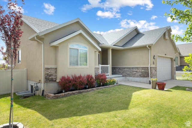 4509 S Greystock Cir W, West Valley City, UT 84120 - ranch-style home featuring stone siding, a garage, stucco siding, roof with shingles, and concrete driveway