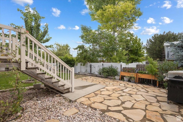4509 S Greystock Cir W, West Valley City, UT 84120 - view of patio featuring a grill