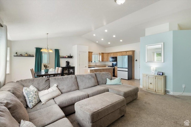 4509 S Greystock Cir W, West Valley City, UT 84120 - living area with a chandelier, lofted ceiling, plenty of natural light, light colored carpet, and recessed lighting