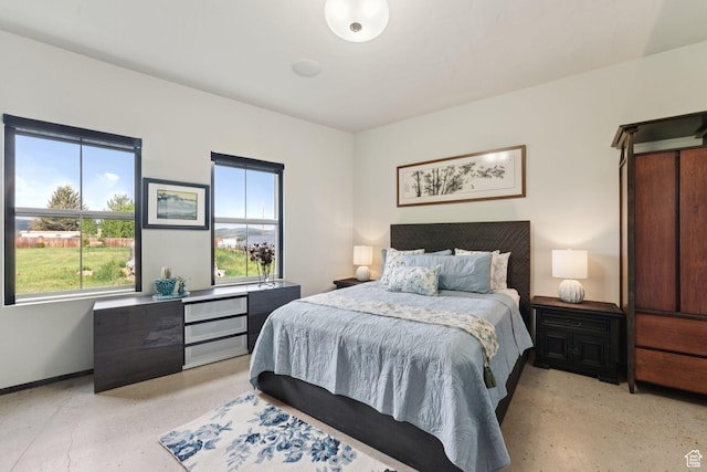 3530 N State Road 32, Marion, UT 84036 - bedroom with multiple windows and dark aggregate flooring