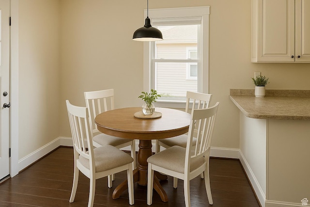 1145 S Liberty Ave E, Ogden, UT 84404 - dining room with baseboards and dark wood-style floors