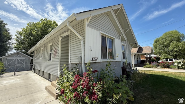 1145 S Liberty Ave E, Ogden, UT 84404 - view of property exterior with an outdoor structure