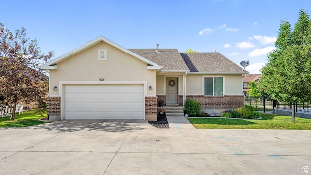 950 N 90 W, Santaquin, UT 84655 - view of front of property featuring stucco siding, concrete driveway, brick siding, an attached garage, and a shingled roof