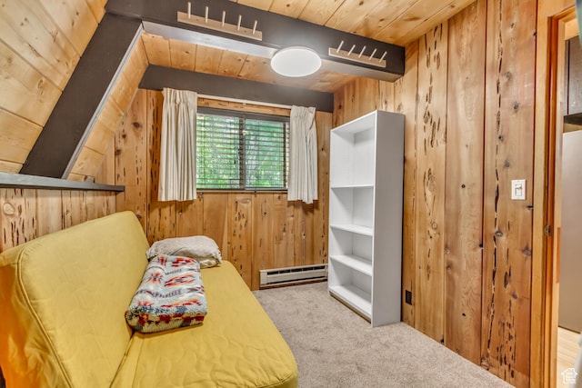 4601 Conifer Dr, Oakley, UT 84055 - living area with a baseboard radiator, carpet, wooden walls, and wooden ceiling