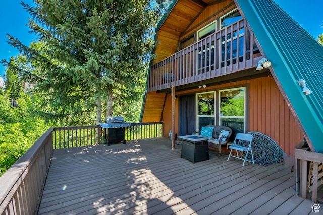 4601 Conifer Dr, Oakley, UT 84055 - wooden terrace featuring a grill and a fire pit