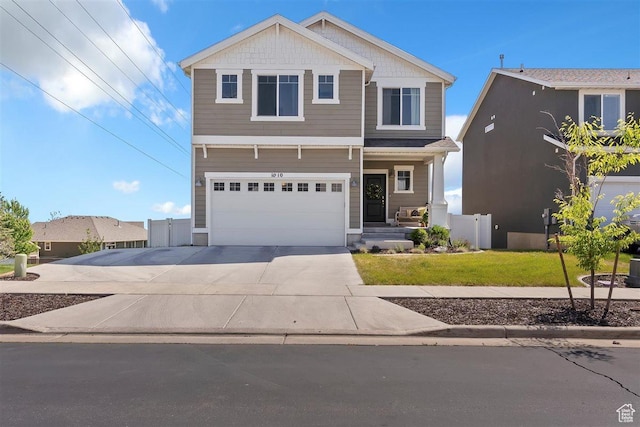 1010 E Bigelow Ave, Layton, UT 84040 - view of front of property with concrete driveway and an attached garage