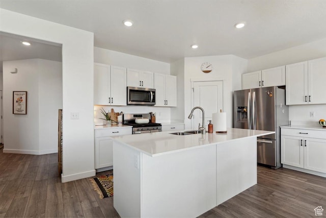 1010 E Bigelow Ave, Layton, UT 84040 - kitchen featuring stainless steel appliances, white cabinets, a center island with sink, and recessed lighting