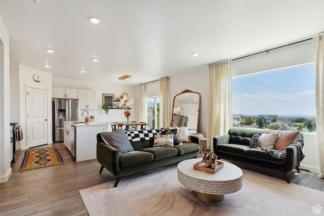 1010 E Bigelow Ave, Layton, UT 84040 - living area with wood finished floors and recessed lighting