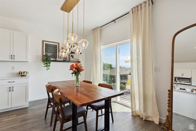 1010 E Bigelow Ave, Layton, UT 84040 - dining room featuring dark wood-style floors