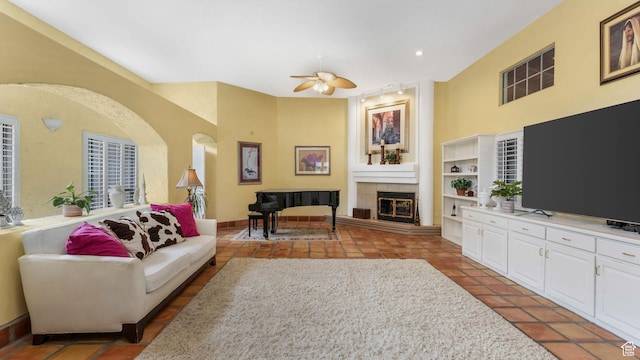 3175 N 140 W, Provo, UT 84604 - living room with ceiling fan, a fireplace, tile patterned flooring, and recessed lighting