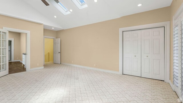 3175 N 140 W, Provo, UT 84604 - unfurnished bedroom featuring a skylight, carpet flooring, lofted ceiling, recessed lighting, and a closet