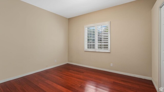3175 N 140 W, Provo, UT 84604 - spare room featuring dark wood-style flooring and baseboards