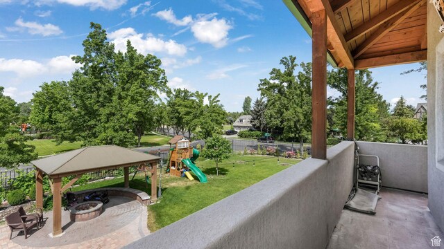 3175 N 140 W, Provo, UT 84604 - balcony featuring an outdoor fire pit and view of wooded area