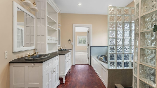 3175 N 140 W, Provo, UT 84604 - bathroom with vanity, wood finished floors, and a garden tub
