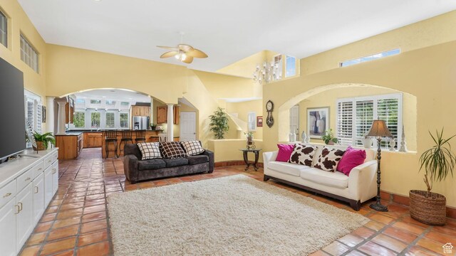 3175 N 140 W, Provo, UT 84604 - living area with plenty of natural light, ornate columns, arched walkways, and a high ceiling