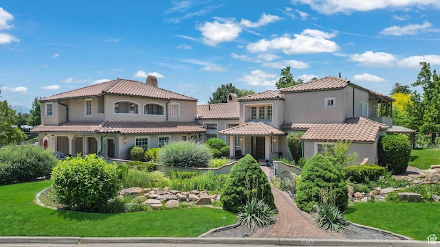 3175 N 140 W, Provo, UT 84604 - mediterranean / spanish-style house with stucco siding and a front lawn