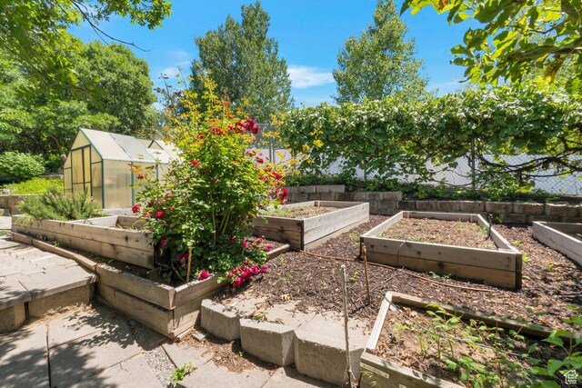 1028 E 140 N, Lindon, UT 84042 - view of yard with a garden, a greenhouse, and an outdoor structure