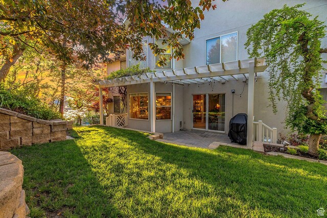1028 E 140 N, Lindon, UT 84042 - rear view of property featuring stucco siding, a lawn, a pergola, and a patio area