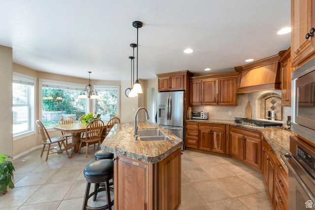 1028 E 140 N, Lindon, UT 84042 - kitchen with appliances with stainless steel finishes, brown cabinets, light tile patterned flooring, healthy amount of natural light, and recessed lighting