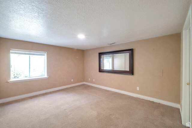1028 E 140 N, Lindon, UT 84042 - empty room featuring light colored carpet and a textured ceiling