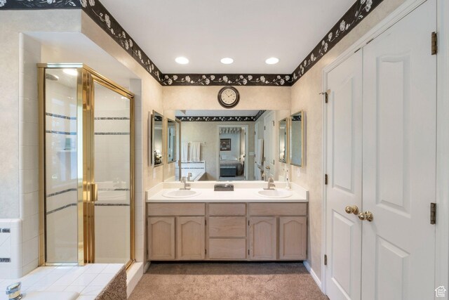 1028 E 140 N, Lindon, UT 84042 - bathroom featuring a stall shower, double vanity, and recessed lighting