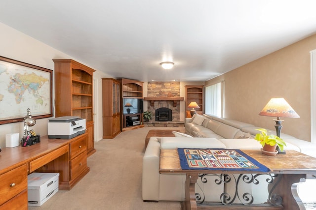 1028 E 140 N, Lindon, UT 84042 - living area with built in shelves, a stone fireplace, light colored carpet, and a desk