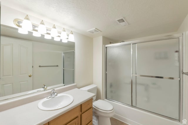 1028 E 140 N, Lindon, UT 84042 - bathroom with vanity, bath / shower combo with glass door, and a textured ceiling