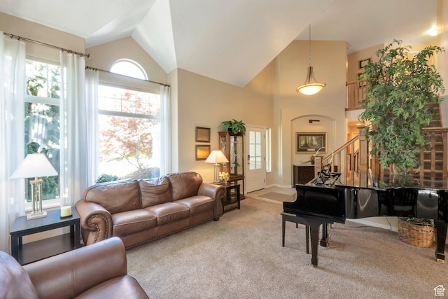 1028 E 140 N, Lindon, UT 84042 - carpeted living area with stairway and high vaulted ceiling