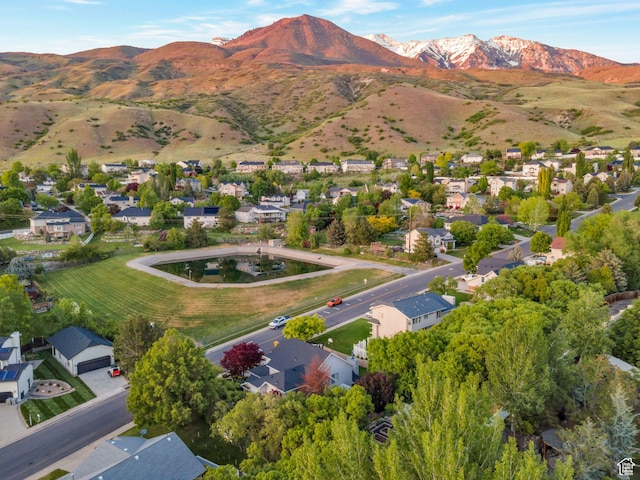 1028 E 140 N, Lindon, UT 84042 - aerial view of property and surrounding area with mountains and nearby suburban area