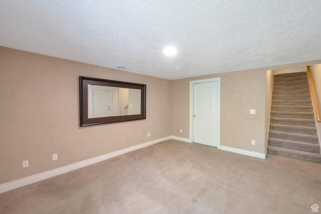 1028 E 140 N, Lindon, UT 84042 - below grade area with stairway, carpet floors, and a textured ceiling