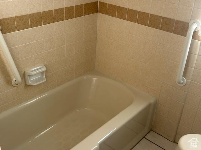 1567 E Westminster Ave, Salt Lake City, UT 84105 - bathroom with a tub to relax in and tile patterned flooring