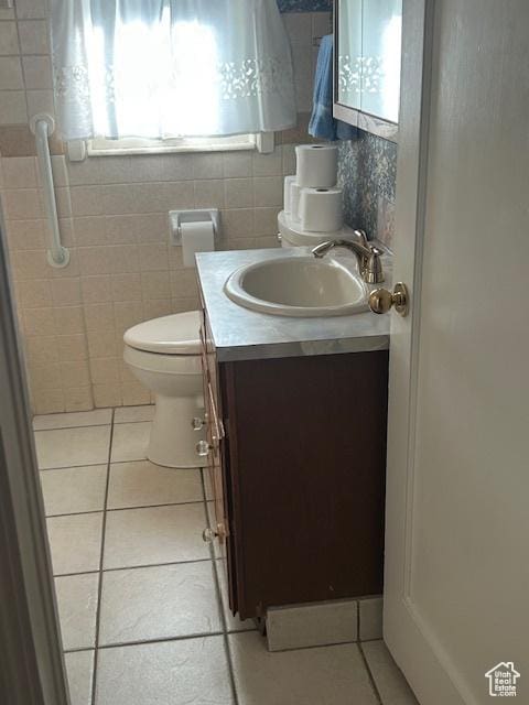 1567 E Westminster Ave, Salt Lake City, UT 84105 - bathroom with tile patterned flooring and vanity