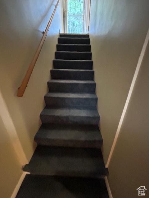 1567 E Westminster Ave, Salt Lake City, UT 84105 - stairway featuring baseboards