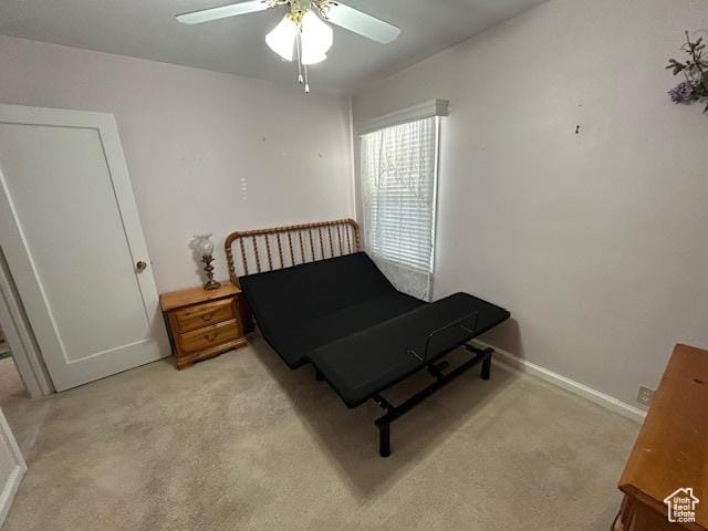 1567 E Westminster Ave, Salt Lake City, UT 84105 - bedroom with light colored carpet and ceiling fan