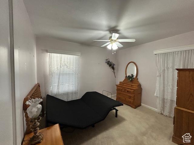 1567 E Westminster Ave, Salt Lake City, UT 84105 - bedroom featuring light colored carpet and ceiling fan